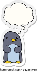 cartoon penguin with thought bubble as a printed sticker