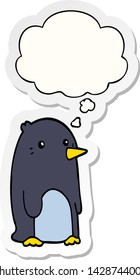 pingüino de dibujos animados con burbuja de pensamiento como pegatina impresa