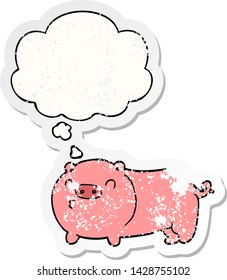 cartoon pig with thought bubble as a distressed worn sticker