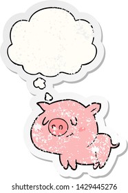 cartoon pig with thought bubble as a distressed worn sticker