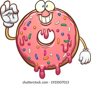 Cartoon pink donut character making the okay hand sign. Vector clip art illustration with simple gradients. All on a single layer.
