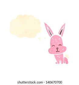 cartoon pink rabbit with thought bubble