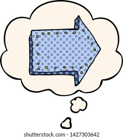 cartoon pointing arrow with thought bubble in comic book style