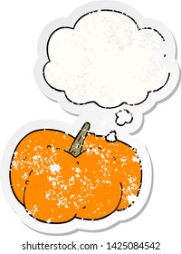 cartoon pumpkin squash with thought bubble as a distressed worn sticker