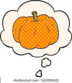 cartoon pumpkin with thought bubble in comic book style