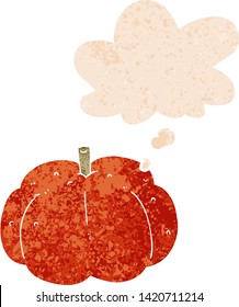 cartoon pumpkin with thought bubble in grunge distressed retro textured style