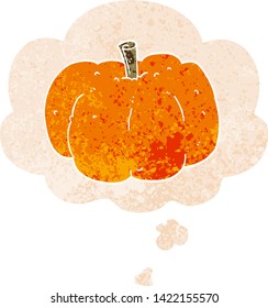 cartoon pumpkin with thought bubble in grunge distressed retro textured style