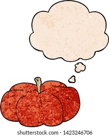 cartoon pumpkin with thought bubble in grunge texture style