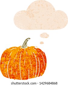 cartoon pumpkin with thought bubble in grunge distressed retro textured style