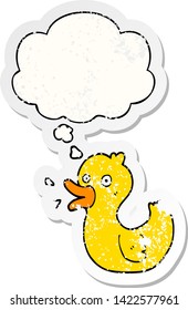 cartoon quacking duck with thought bubble as a distressed worn sticker