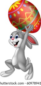 Cartoon rabbit carrying Easter egg