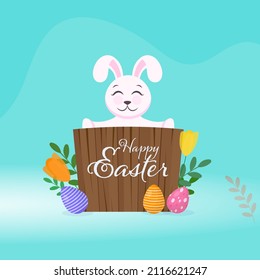 Cartoon Rabbit Holding Wooden Board Of Happy Easter With Printed Eggs And Floral On Turquoise Background.
