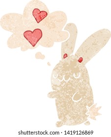 cartoon rabbit in love with thought bubble in grunge distressed retro textured style