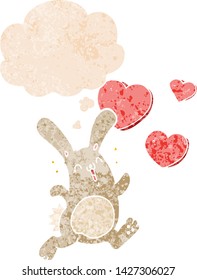 cartoon rabbit in love with thought bubble in grunge distressed retro textured style