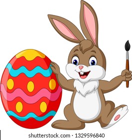 Cartoon rabbit painting an Easter egg