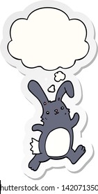 cartoon rabbit running with thought bubble as a printed sticker