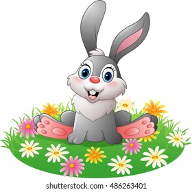 Cartoon rabbit sitting on the grass