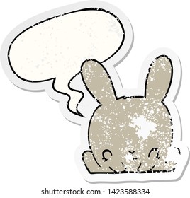 cartoon rabbit with speech bubble distressed distressed old sticker