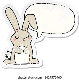 cartoon rabbit with speech bubble distressed distressed old sticker