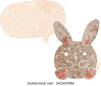 cartoon rabbit with speech bubble in grunge distressed retro textured style