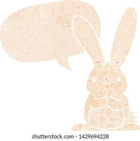 cartoon rabbit with speech bubble in grunge distressed retro textured style