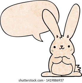 cartoon rabbit with speech bubble in retro texture style