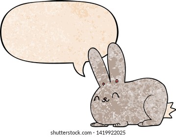 cartoon rabbit with speech bubble in retro texture style