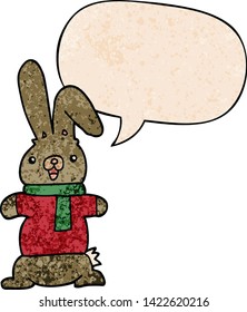 cartoon rabbit with speech bubble in retro texture style