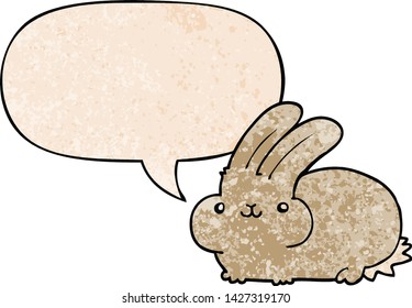 cartoon rabbit with speech bubble in retro texture style