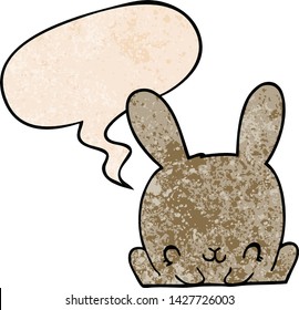 cartoon rabbit with speech bubble in retro texture style