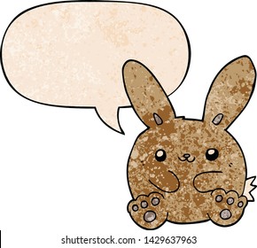 cartoon rabbit with speech bubble in retro texture style