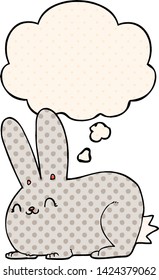 cartoon rabbit with thought bubble in comic book style