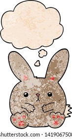 conejo de dibujos animados con burbuja de pensamiento en forma de textura gruesa