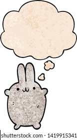 conejo de dibujos animados con burbuja de pensamiento en forma de textura gruesa