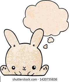 cartoon rabbit with thought bubble in grunge texture style
