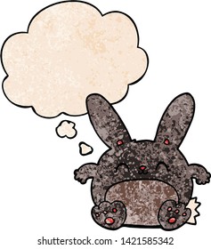 Cartoon-Kaninchen mit Gedankenblase im Stilstil