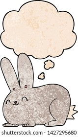 conejo de dibujos animados con burbuja de pensamiento en forma de textura gruesa