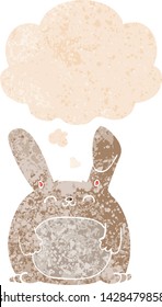 conejo de dibujos animados con burbuja de pensamiento en un estilo retro angustiado con texturas estrafalarias
