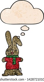 cartoon rabbit with thought bubble in grunge texture style