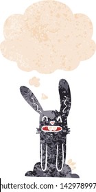 cartoon rabbit with thought bubble in grunge distressed retro textured style