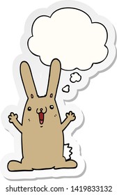 conejo de dibujos animados con burbuja de pensamiento como pegatina impresa