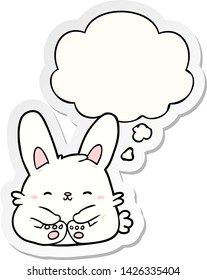 cartoon rabbit with thought bubble as a printed sticker