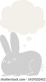 cartoon rabbit with thought bubble in retro style