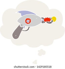 pistola de rayos de dibujos animados con burbuja de pensamiento en estilo retro