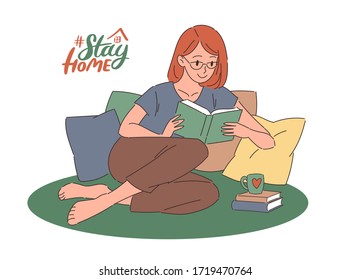 Cartoon redhead young woman in glasses sitting on pillows and reading a book. Flat vector illustration with lettering. Stay home, introvert concept for social media, web banner.