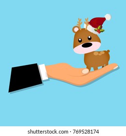 cartoon reindeer or deer sitting on a hand. Deer toy or character. Happy new year design