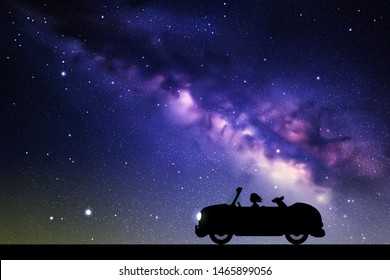 Cartoon retro car on road at night. Vector illustration with silhouettes of woman and dog traveling in camper. Family road trip. Space dark background with starry sky and Milky Way