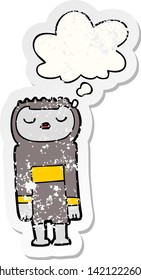cartoon robot with thought bubble as a distressed worn sticker
