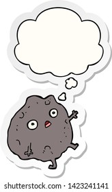 cartoon rock falling with thought bubble as a printed sticker