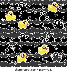 cartoon rubber ducks in black water seamless pattern